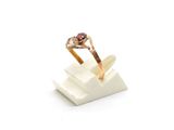 an image of a gold ring with a garnett on it