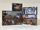 Trois coffrets Lego Star Wars sont exposés sur une surface blanche