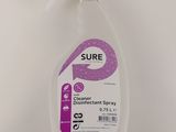 une bouteille de « Sure Cleaner » sur fond blanc