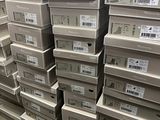 boxes stacked on top of each other in a store