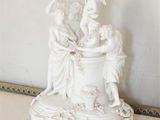 a statue that is sitting on top of a table