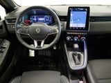 a picture of the interior of a car with a touch screen
