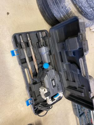 a tool kit that is sitting on the floor