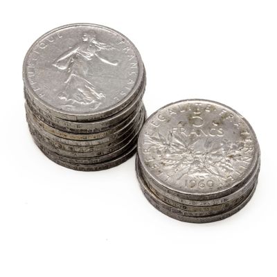a lot of coins sitting on top of each other