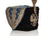 an image of a black and blue purse with gold trims