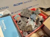 a box full of assorted items sitting on the floor
