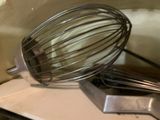 a whisk and a whisk on a counter top