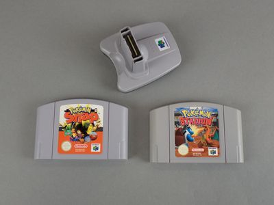 two nintendo game cartridges sitting next to each other on a table