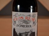 a bottle of wine that is sitting on a table