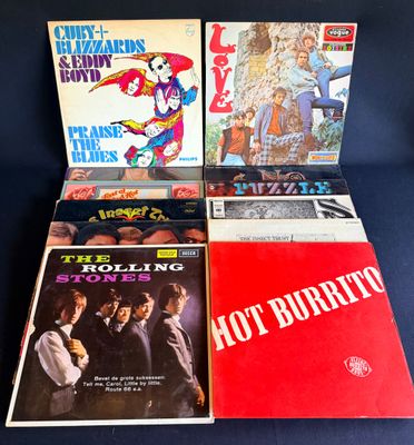 quatre disques vinyles, dont les Rolling Stones, les Rolling Stones et les Rolling Stones
