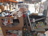 a cart full of stuff sitting on the street