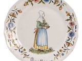 a plate with a picture of a woman holding a basket of flowers