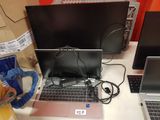 three laptops that are sitting on a table