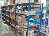 many boxes and boxes on the shelves in the warehouse