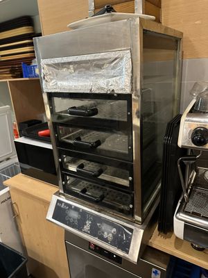 a toaster oven and a toaster oven sitting on a counter