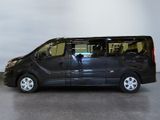 a picture of a black van parked in a garage