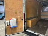 a picture of the inside of a van with the door open