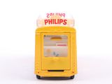a yellow toy vending machine on a white surface