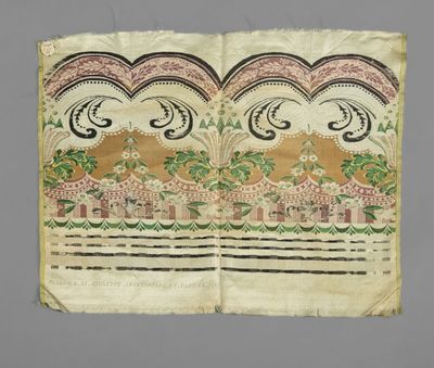 an old book with floral designs on it
