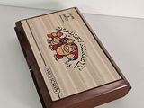 an image of a wooden box with a cartoon character on it