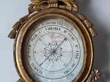 a clock that is hanging on the wall