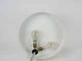 a light bulb that is sitting in a white bowl