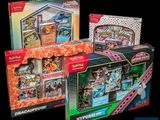 trois types différents de cartes Pokémon dans un présentoir