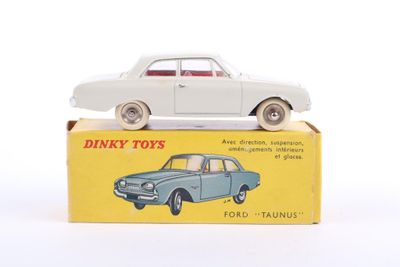 a small toy car sitting on top of a box