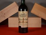 a bottle of wine that is sitting on a table