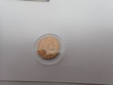 a piece of bread in a plastic container on a table