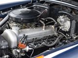 a close up of a car ' s engine with the hood open