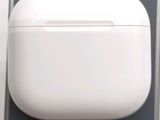 a white apple airpods sitting on top of a table