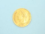 an image of a gold coin on a blue surface