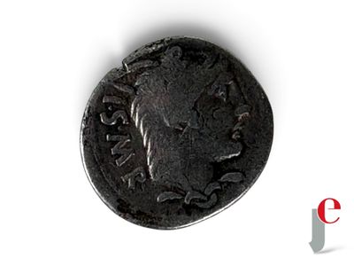 une image d'une pièce de monnaie sur laquelle figure le portrait d'un homme