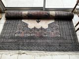 an image of a rug on the floor in front of a window