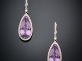 une paire de boucles d'oreilles en améthorate et diamants