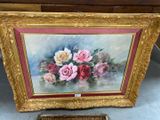a picture of a painting of roses on a table