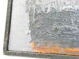 a picture of a painting of a city on a window sill