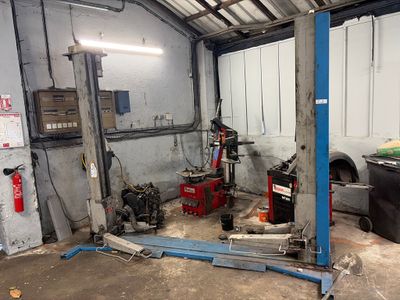 an image of a garage with a lot of tools in it