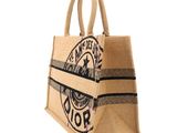 a large jute bag with a logo on it