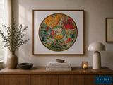a picture of a painting on the wall above a dresser