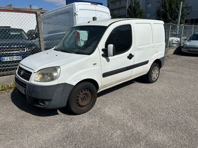 a white van that is parked in a parking lot