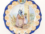 a plate with a picture of a woman and a child on it