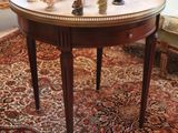 a small table with a lot of figurines on it