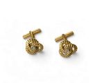 a pair of gold and diamond cufflinks