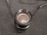 a camera lens that is sitting on a table