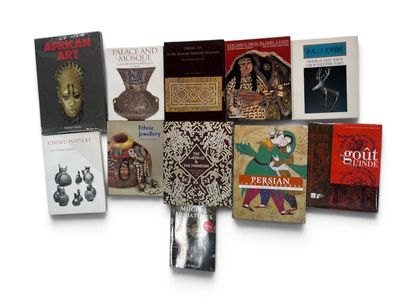 a lot of books that are sitting on a table