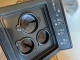 a black stove top oven sitting on top of a counter