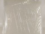 a bag of plastic wrap on top of a table