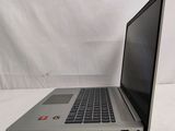 an open laptop computer sitting on top of a white table